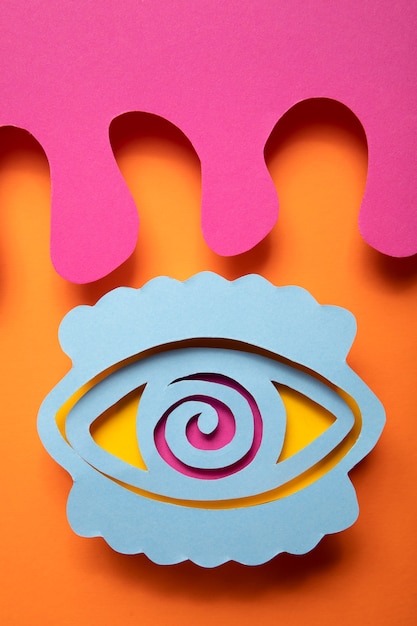 Psychedelic paper shapes with eye