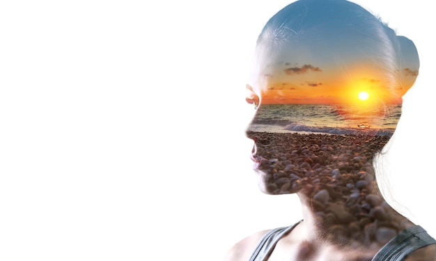 Psychoanalysis and meditation, concept. Profile of a young woman and sunset over the ocean,