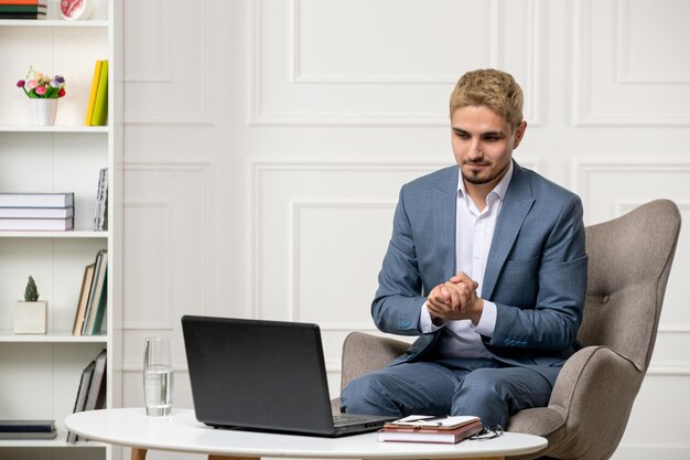 Psychologist providing online sessions cute handsome young professional man holding hands tight