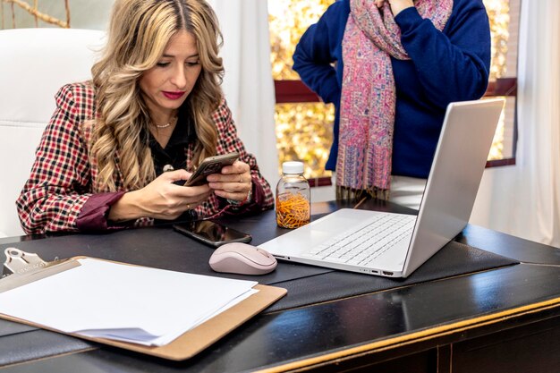 Psychologist scheduling her next appointments with patients