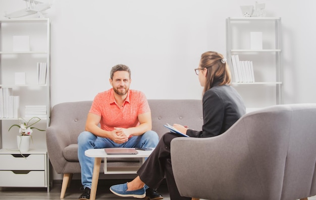 Psychology mental therapy psychologist with man at psychotherapy session on psychological consultation Middle aged man problem therapy