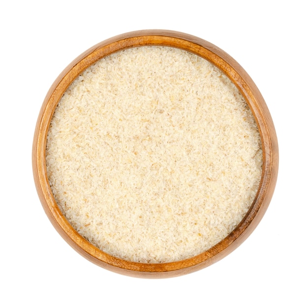 Psyllium husks in a wooden bowl