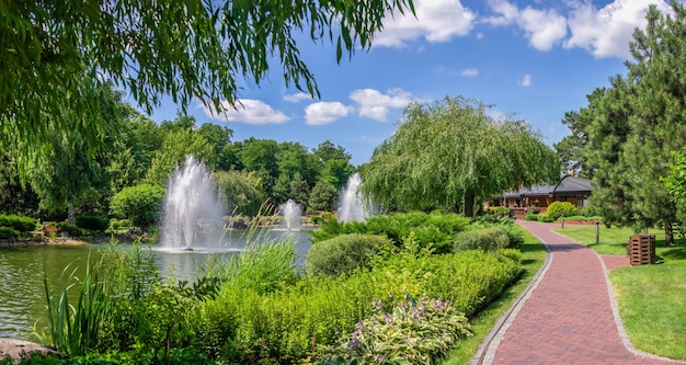 Public park near the Honka house in the Mezhyhirya Residence, Kyiv, Ukraine, on a sunny summer day