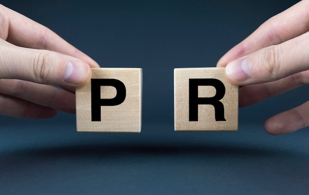 Public Relations Cubes form the words PR Public Relations