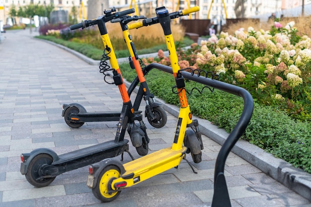 Public rental electric scooters in the parking lot