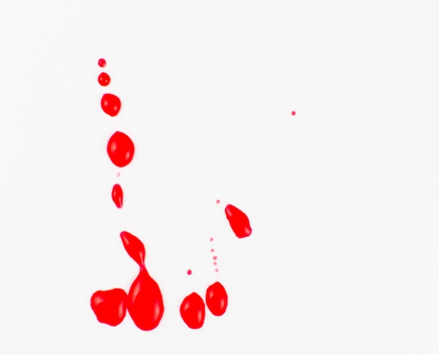 Photo puddles of blood on a white background