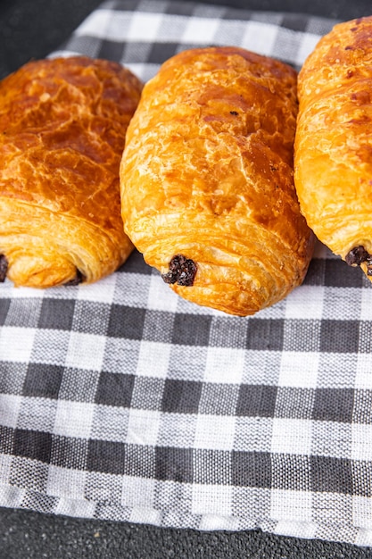 puff buns chocolate fresh filling bun bakery meal food snack on the table copy space food