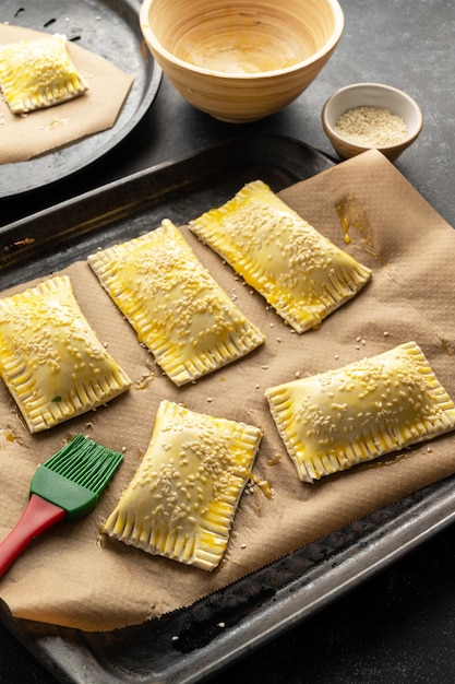 Puff pastry dough Folded raw puff pastry on a table cooking process