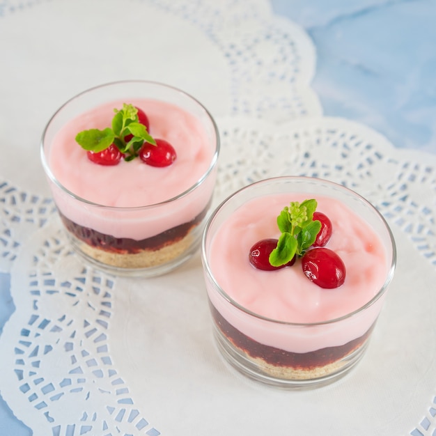 puff pastry in a glass bowl with berries top view