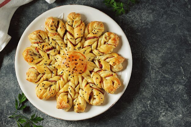 Puff pastry pie with ham and cheese