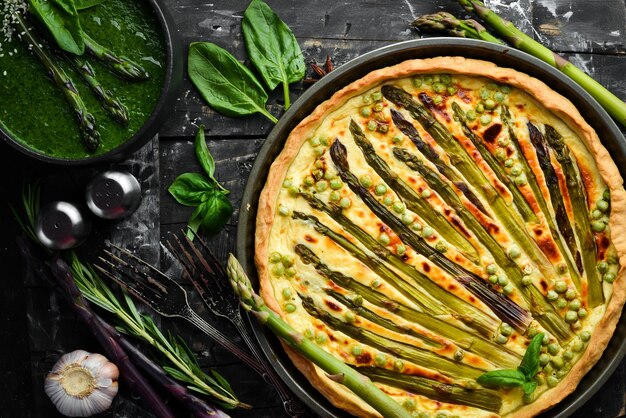 Puff pastry tart with asparagus and spices Healthy food Top view Free space for your text