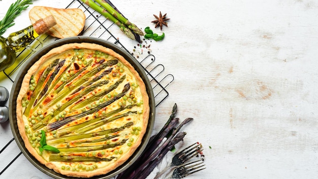 Puff pastry tart with asparagus and spices Healthy food Top view Free space for your text