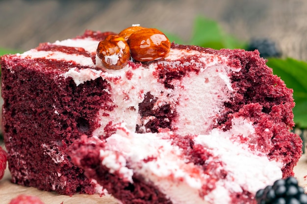 Puff pastry with white cream filling and red dough and puff pastry with raspberries and blackberries