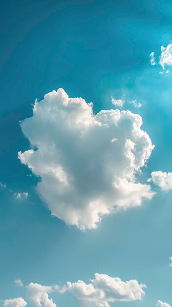 Puffy clouds form a heart shape on the blue sky summer day beautiful landscape