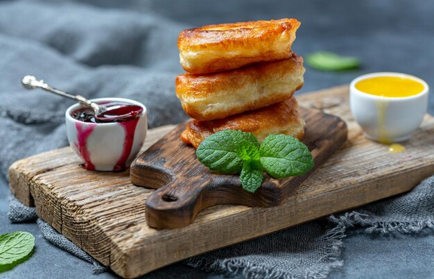 Puffy yeast pancakes with berry sauce