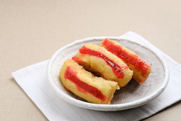 Pukis or Kue Pukis with strawberry jam is a popular traditional snack in Indonesia