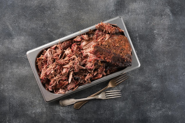 Pulled pork Slow cooked pulled pork shoulder Juicy pork meat cooked in a smoker by low and slow