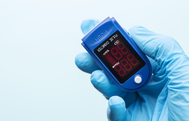 Pulse oximeter in doctor hand