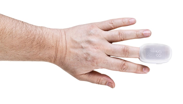 Photo pulse oximeter on male finger tip isolated