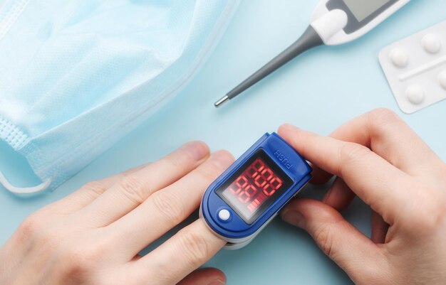 Photo pulse oximeter measuring oxygen saturation in blood and heart rate