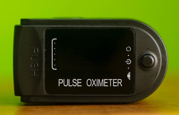 Pulse Oximeter, off position, for checking oxygen saturation in blood and heart rate, in shallow focus.