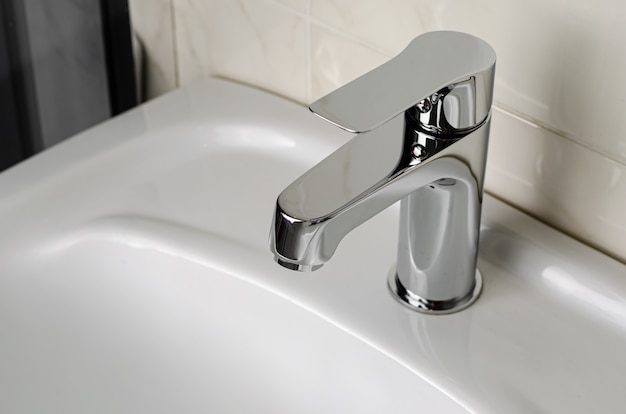 Pumbing concept. Water tap, faucet. Copy space
