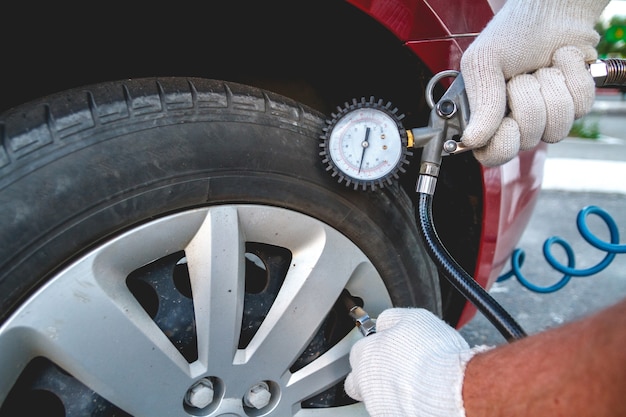 pumping car tires in the service station