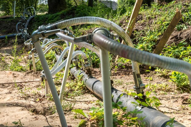 Pumping station groundwater drainage system pumps water out of the ground dehydration gravel rural route