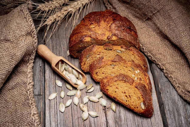 Pumpkin bread. Freshly baked traditional bread on wooden table