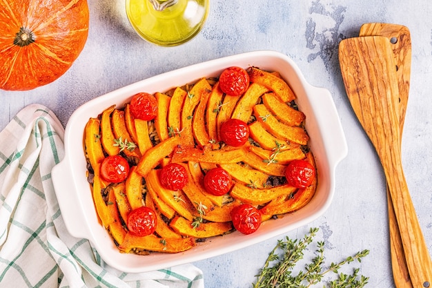 Pumpkin casserole with meat, rice, tomatoes