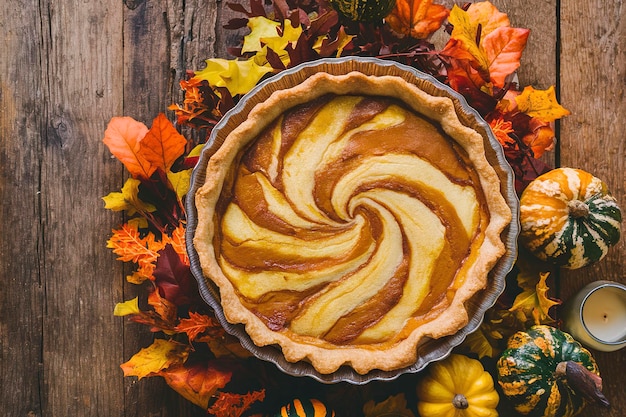 Pumpkin cheesecake swirl pie fall or Thanksgiving dessert idea