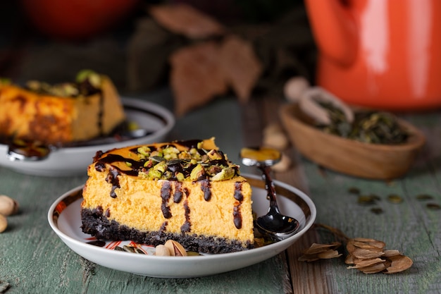 Pumpkin cheesecake with pistachios and chocolate