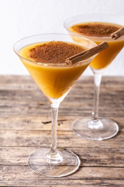 Pumpkin cocktail in glass isolated on white