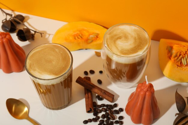 Pumpkin coffee spices and pumpkins on white background