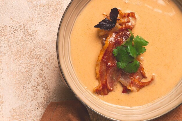 Pumpkin cream soup curry fried bacon top view no people