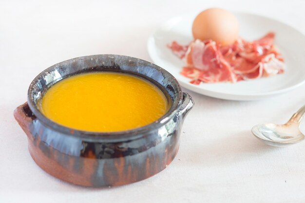 Pumpkin cream with egg and ham