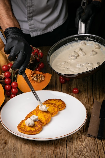 a pumpkin dish prepared by a chef in a restaurant