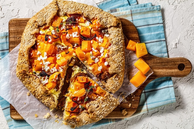 Pumpkin galette with onion and feta cheese