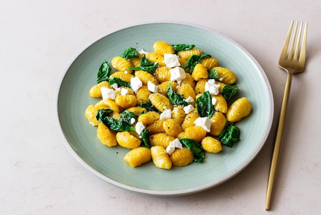 Pumpkin gnocchi with spinach and white cheese Healthy eating Vegetarian food