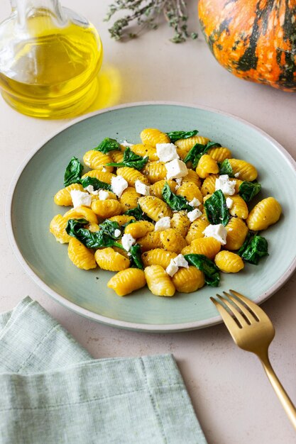 Pumpkin gnocchi with spinach and white cheese Healthy eating Vegetarian food