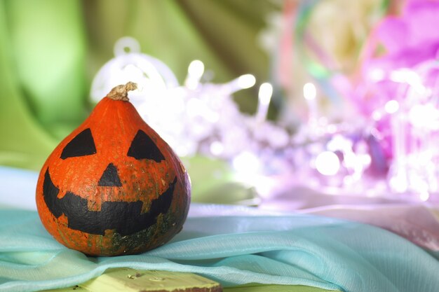 Pumpkin head face and light garland