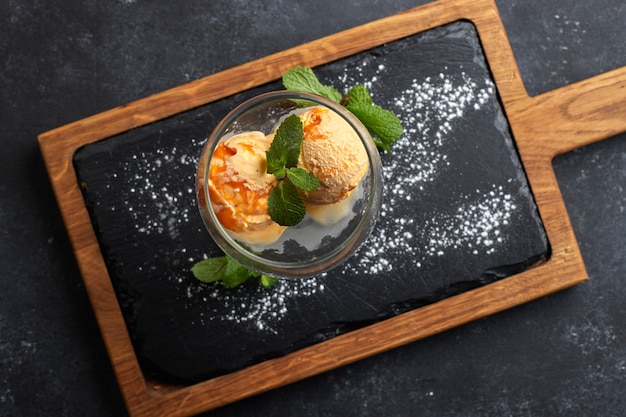 Pumpkin ice cream in a glass goblet