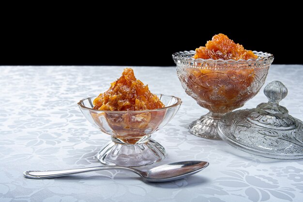 Photo pumpkin jam on grey tablecloth