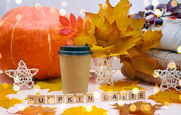 Pumpkin latte Hot autumn coffee drink Flat lay Keyboard layout