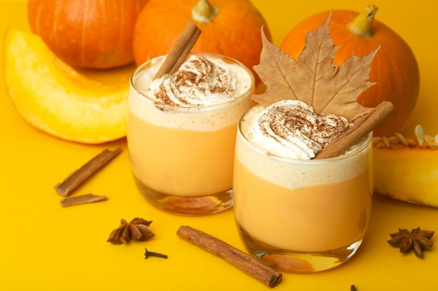 Pumpkin latte with cinnamon in glasses