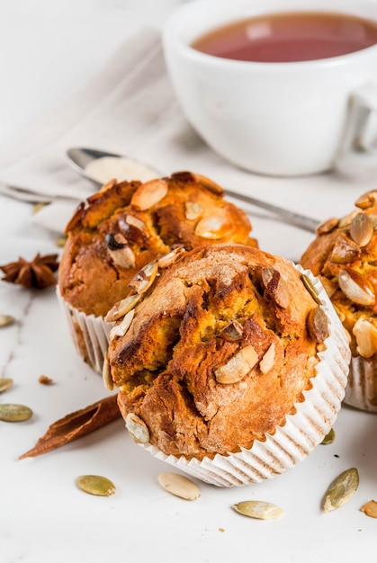 pumpkin muffins with traditional fall spices and tea