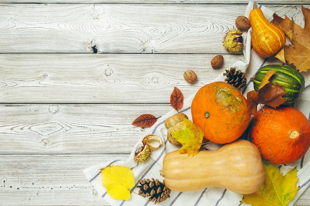 Pumpkin on old rustic wooden table.