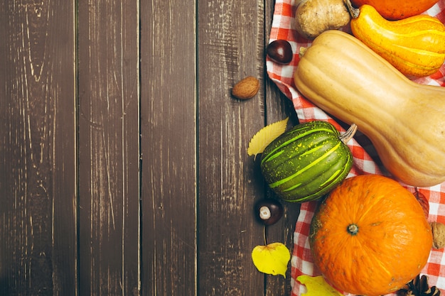 Pumpkin on old rustic wooden table,