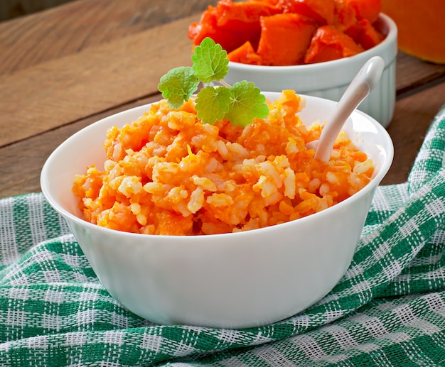 Pumpkin porridge in white bowl