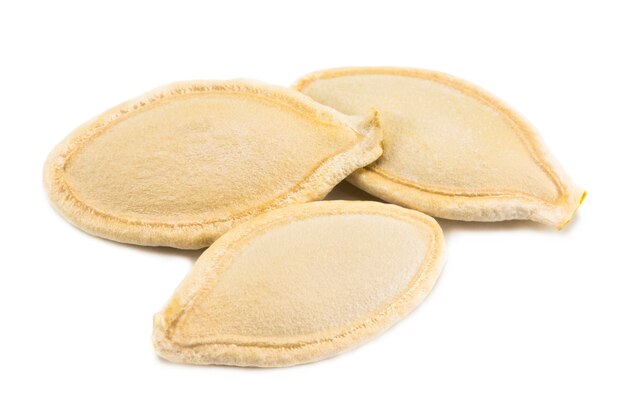 Pumpkin seeds isolated on the white background.